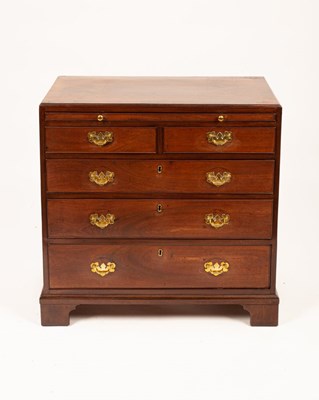 Lot 470 - A George III mahogany chest, fitted a brushing...