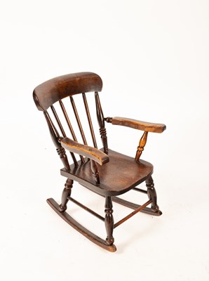 Lot 475 - A late 19th Century child's rocking chair with...