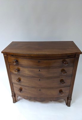 Lot 477 - A Regency mahogany bowfront chest of drawers,...