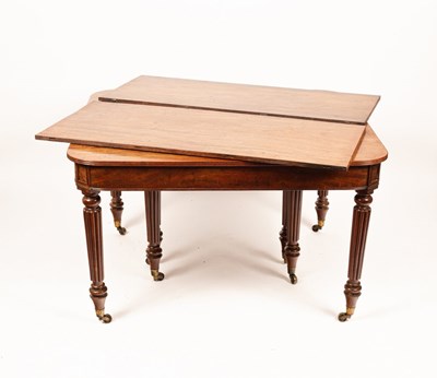 Lot 482 - A Regency mahogany extending dining table, the...