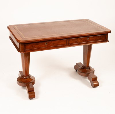 Lot 486 - A William IV walnut writing table, the leather...