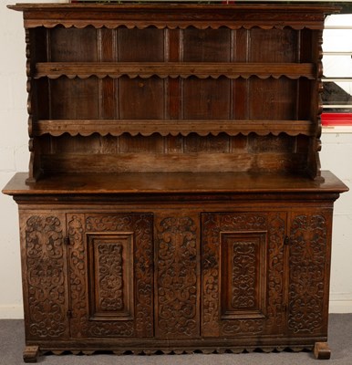 Lot 493 - A large 19th Century Spanish oak dresser, the...