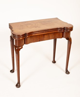 Lot 494 - A George II mahogany card table with double...