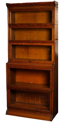 Lot 498 - An oak Globe Wernicke type bookcase, by Gumm,...