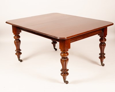 Lot 504 - A Victorian mahogany extending dining table...