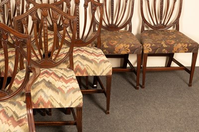 Lot 509 - A set of sixteen George III style shield back...