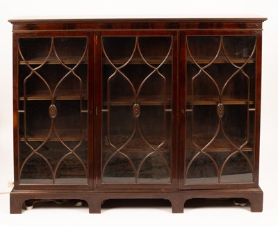 Lot 512 - A mahogany and glazed bookcase by Wylie &...