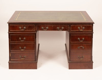 Lot 514 - A 20th Century mahogany pedestal desk, the...