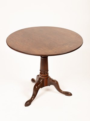 Lot 518 - A George III mahogany tripod supper table,...