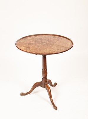 Lot 523 - A 19th Century oak tripod table, the dished...