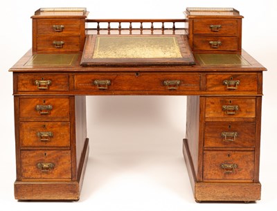 Lot 526 - A Victorian walnut twin-pedestal desk, with...