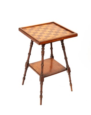 Lot 534 - An Edwardian rosewood and beech games table,...