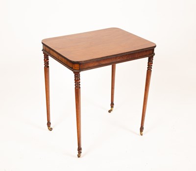 Lot 547 - A Regency mahogany centre table with beaded...