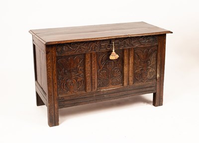 Lot 551 - A 17th Century style oak coffer, the hinged...