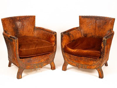 Lot 553 - A pair of brown leather tub chairs with...