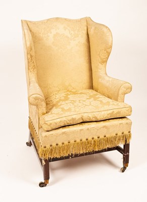 Lot 562 - A George III mahogany wing armchair,...