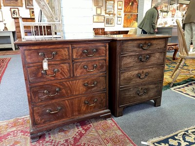 Lot 567 - Two George III mahogany pedestal chests, one...