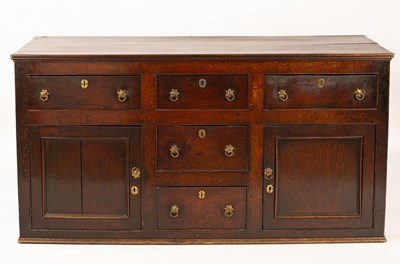 Lot 578 - A George III oak dresser base, arrangement of...