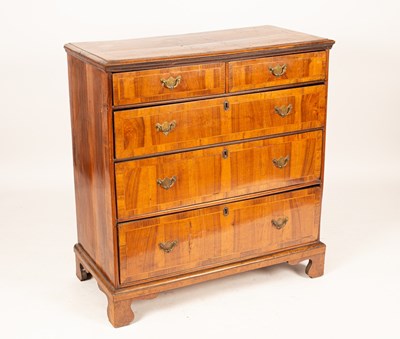 Lot 581 - An 18th Century walnut and featherbanded chest...