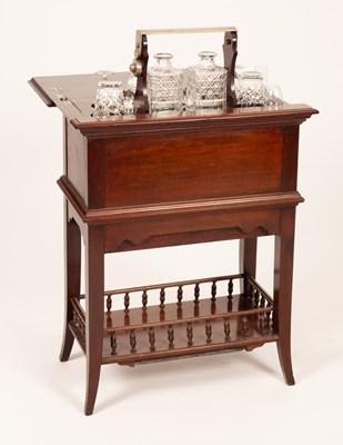 Lot 592 - A Drew & Sons mahogany cocktail cabinet, the...