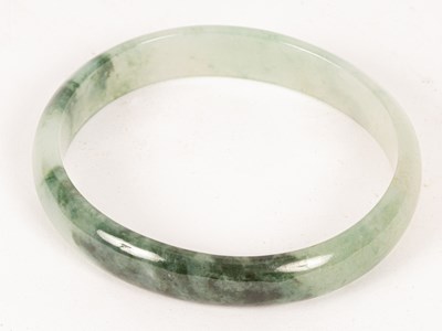 Lot 64 - A Chinese jade bangle, with certificate, boxed,...
