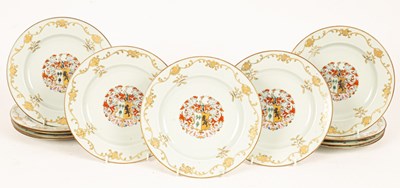 Lot 103 - Twelve Chinese famille rose armorial plates,...