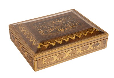 Lot 104 - A Chinese lacquer and gilt decorated games box,...