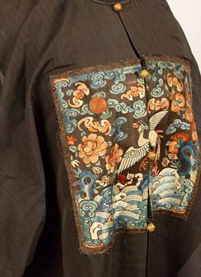 Lot 130 - A Chinese surcoat pufu, 19th Century, in black...