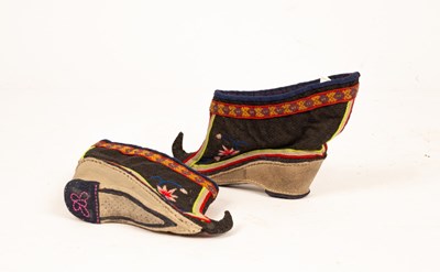 Lot 154 - A pair of Chinese shoes for bound feet with...