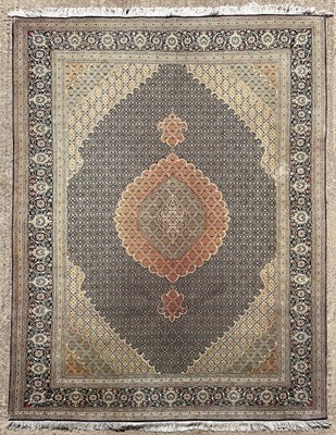 Lot 220 - A part silk Tabriz carpet of Haji Jalili...