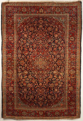 Lot 235 - A Kashan rug, Central Persia, circa 1920, the...