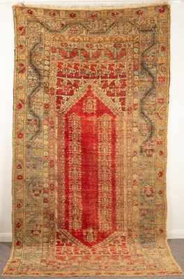 Lot 242 - A large Ghiordes rug, West Anatolia, late 19th...