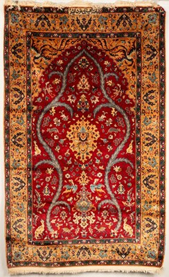 Lot 247 - A Turkish prayer rug, the strawberry red field...