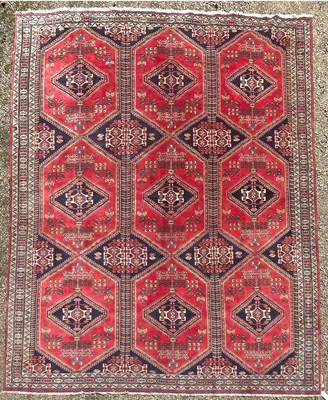 Lot 266 - A Kashgai design carpet, the soft red field of...