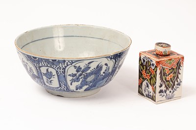 Lot 504 - A Dutch Delft blue and white bowl painted with...