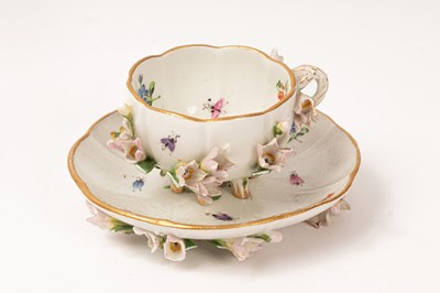 Lot 505 - A Meissen flower encrusted small cabinet cup...