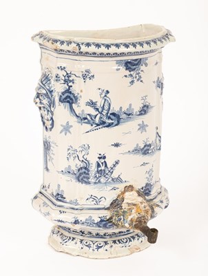 Lot 518 - A Moustiers faience wall cistern, French,...