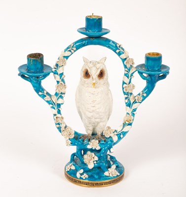 Lot 529 - A Minton porcelain three-light candlestick,...