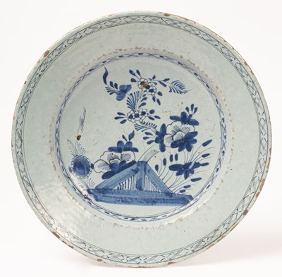 Lot 556 - A Delft blue and white dish, 18th Century,...