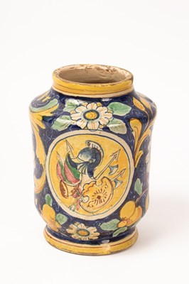 Lot 558 - An Italian polychrome maiolica albarello, in...