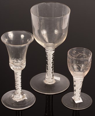 Lot 571 - An English 18th Century wine glass with a bell...