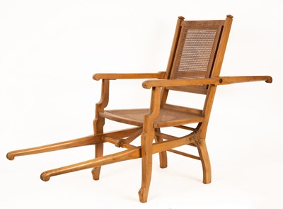 Lot 586 - A folding beech carrying chair by Dupont of...