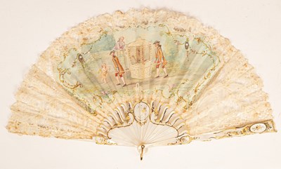 Lot 594 - A Spanish mother-of-pearl, lace and paper fan,...