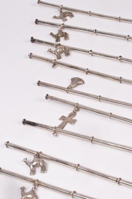 Lot 7 - Nine sterling silver iced tea spoons/straws,...