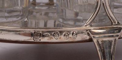 Lot 27 - A George III silver and cut glass cruet stand,...