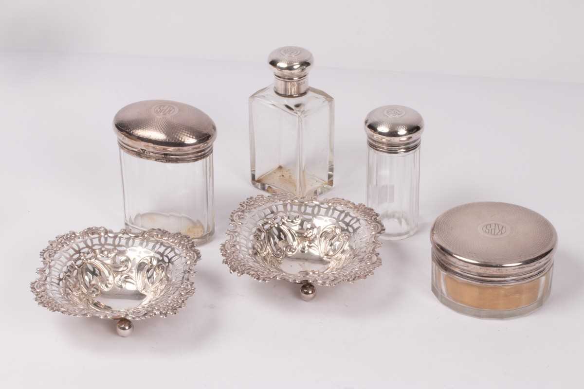 Lot 41 - Four silver mounted bottles/jars, CD, London...