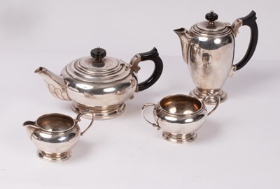 Lot 69 - A sterling silver four-piece tea set, Mappin &...