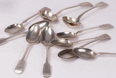 Lot 71 - Eight silver fiddle pattern dessert spoons,...