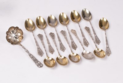Lot 72 - A set of twelve Victorian silver and silver...