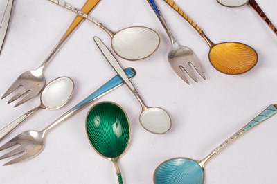 Lot 106 - A set of five Danish silver and enamel spoons,...